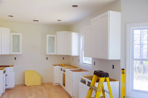 istock Installation of kitchen installs kitchen cabinet. Interior design construction kitchen 960406384