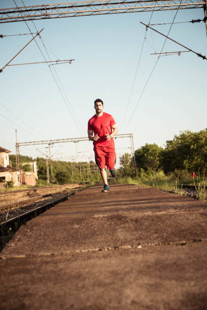 istock A man with a beard jumps in the distance 960406448