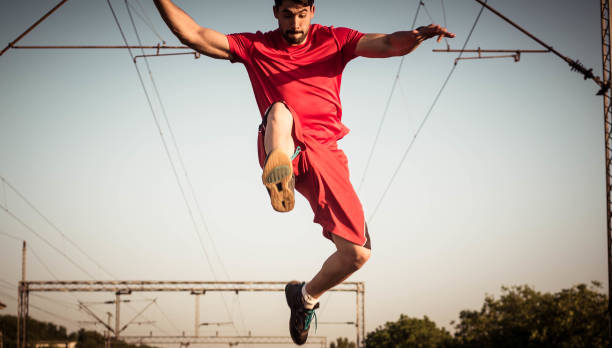 istock A man with a beard jumps in the distance 960406472