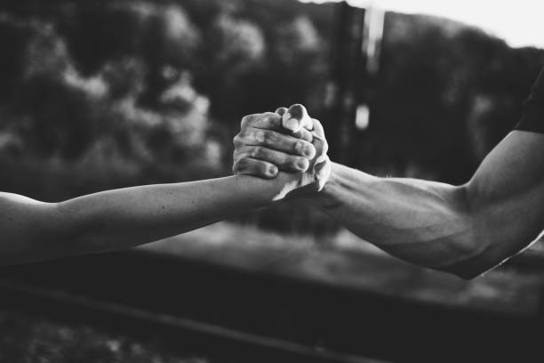 Hand shaking Hand shaking masculinity stock pictures, royalty-free photos & images