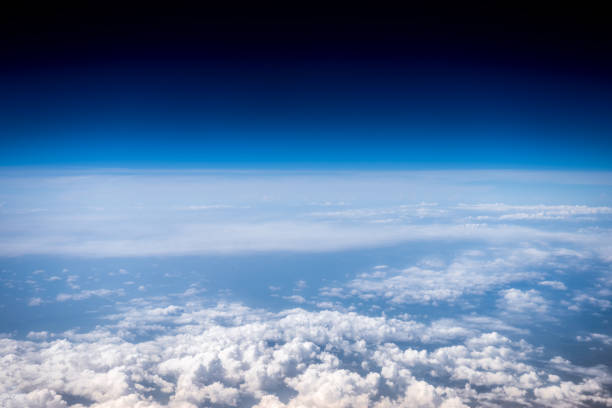 fluffy white clouds and blue sky. stratosphere. view from above - cloud cloudscape stratosphere above imagens e fotografias de stock