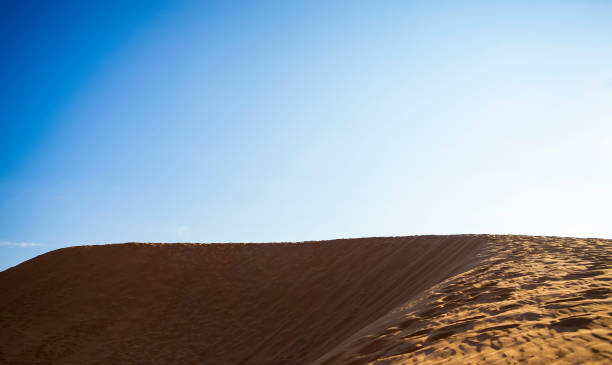 istock Red Sand Dunes and Sky near Mui Ne, Vietnam. 960420408