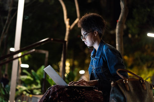 istock Afro young woman working in her laptop 960432266