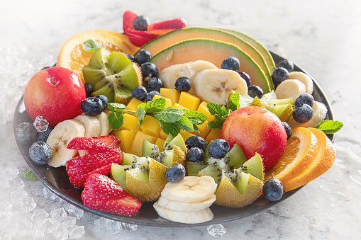 Fruit and berries platter. Healthy diet concept