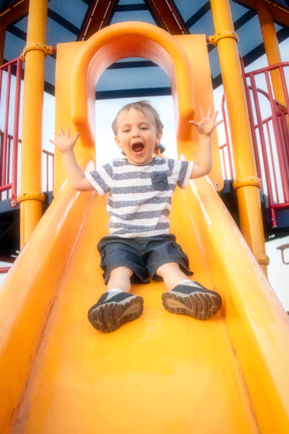 istock Male toddler playing at the playground 960439222