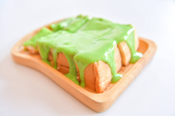 Thai Pandan Custard, Thai pandan mix rice flour in sugar coconut milk, on Bread. Thai dessert.