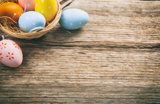 istock Colorful Easter eggs decoration and copy space on wooden background 960444814