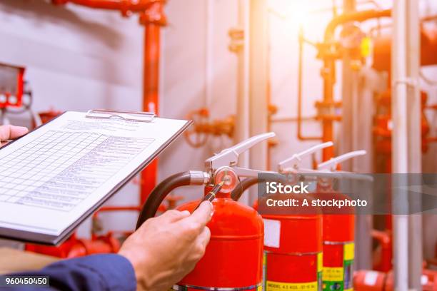 Engineer Checking Industrial Fire Control System Fire Alarm Controller Fire Notifier Anti Firesystem Ready In The Event Of A Fire Stock Photo - Download Image Now