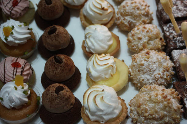 istock Dessert buffet  cake with cream and lemon tartlets 960453124