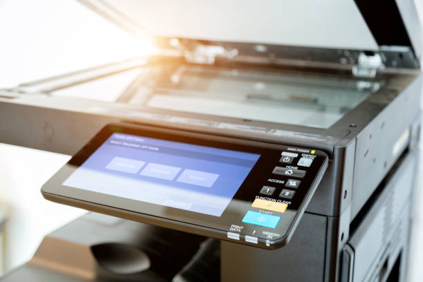 istock Close up paper sheets on the printer in office room. 960462212