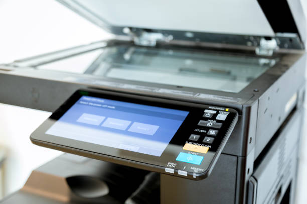 istock Close up paper sheets on the printer in office room. 960462238