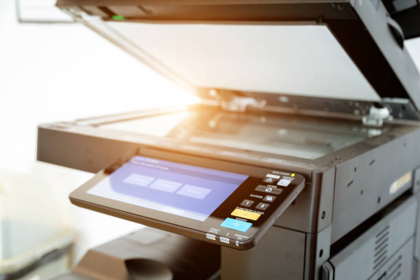 istock Close up paper sheets on the printer in office room. 960462250