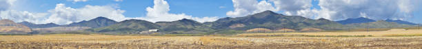 istock Panorama of Oquirrh Mountain range which includes The Bingham Canyon Mine or Kennecott Copper Mine, rumored the largest open pit copper mine in the world in Salt Lake Valley, Utah. USA. 960465470
