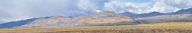 istock Panorama of Oquirrh Mountain range which includes The Bingham Canyon Mine or Kennecott Copper Mine, rumored the largest open pit copper mine in the world in Salt Lake Valley, Utah. USA. 960465472