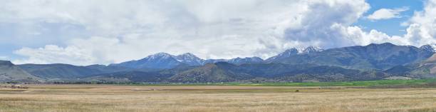 istock Panorama of Oquirrh Mountain range which includes The Bingham Canyon Mine or Kennecott Copper Mine, rumored the largest open pit copper mine in the world in Salt Lake Valley, Utah. USA. 960466496