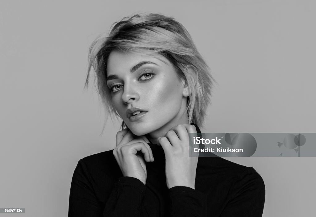 Black and white portrait of fashion blond woman with short hair Beauty portrait of female face with natural skin Women Stock Photo