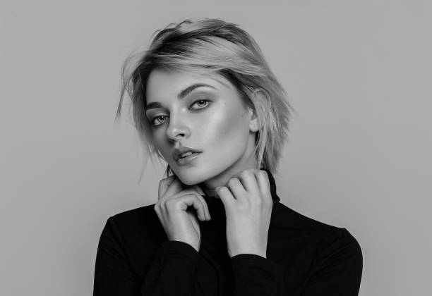 Black and white portrait of fashion blond woman with short hair stock photo