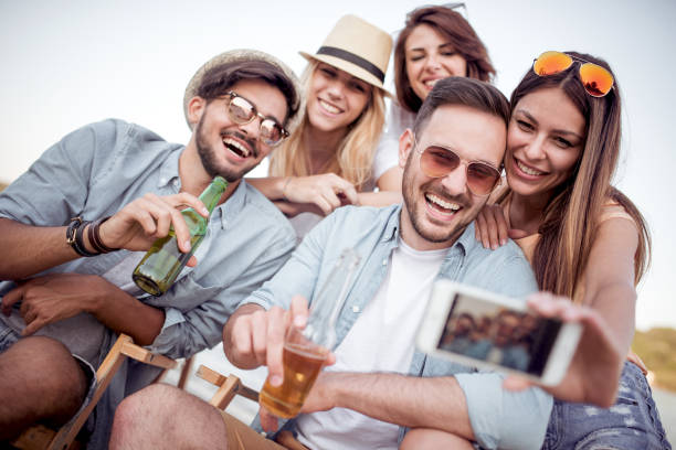 istock Friends having fun on the beach 960471806