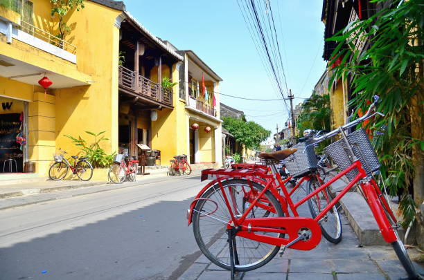 istock old bicycle on yellow wall of building 960472174