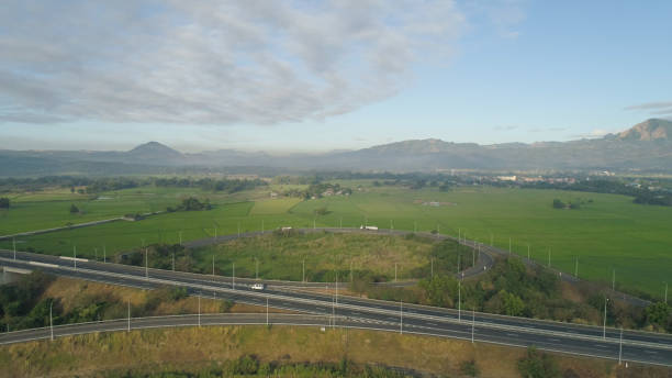 istock Tropical landscape with highway, farmer fields in the Philippines 960478836