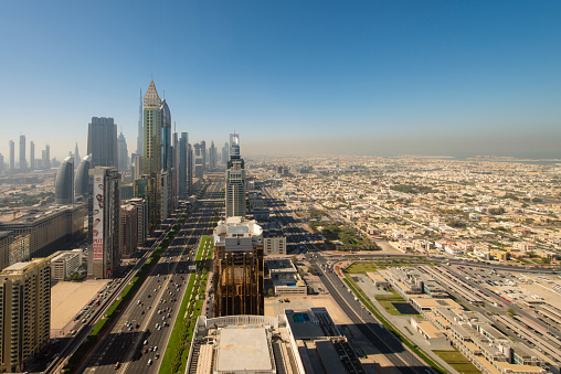 Sheikh Zayed Road and the surrounding skyscrapers in Dubai, seen during the afternoon.