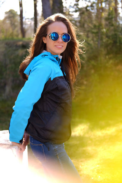 istock Emotional brunette female in sunglasses. 960479716