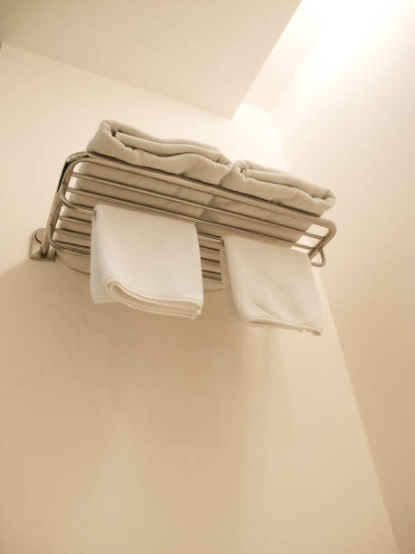 istock White Terry Towels Hanging on the wall in the bathroom / Bottom view 960484040