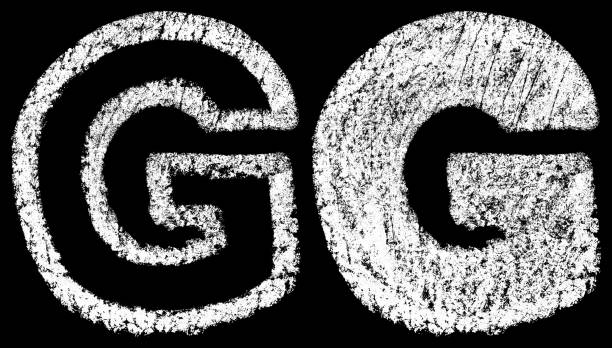 istock handwritten white chalk english letters G isolated on black background 960492976