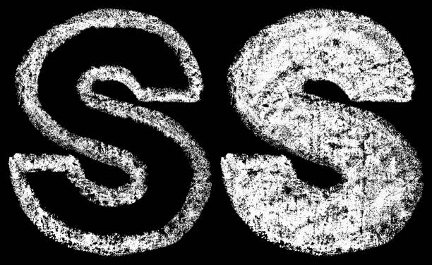 istock handwritten white chalk english letters S isolated on black background 960493018