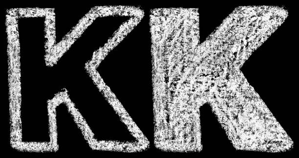 istock handwritten white chalk english letters k isolated on black background 960493020