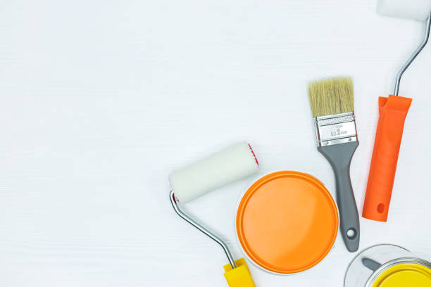 istock painting tools on wooden desk. flat view 960494106