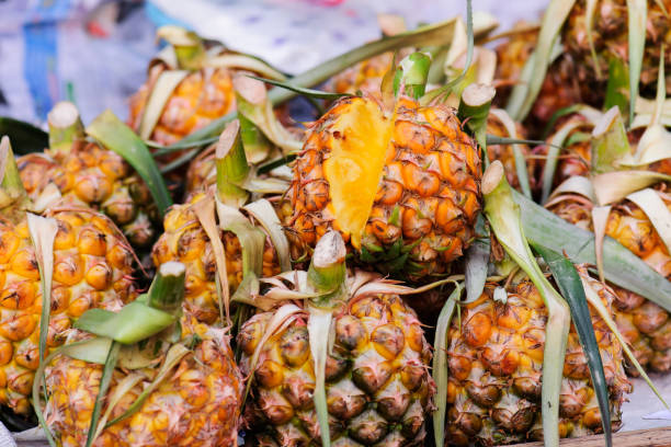 istock ripe pineapple fruit in market 960500720