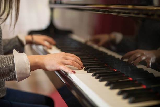 istock Woman playing piano 960501662