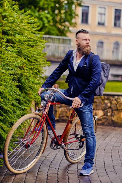 istock A man on a retro bicycle in a park. 960502002