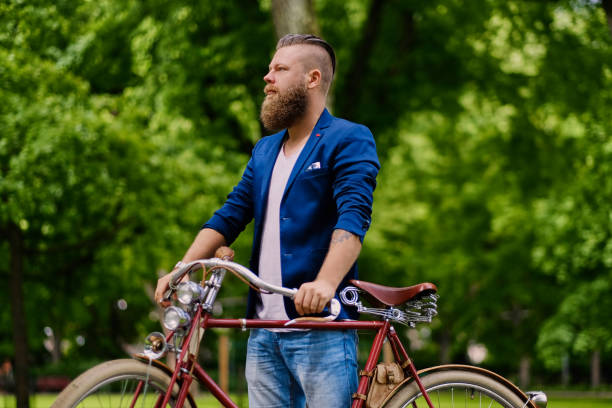 istock Image of a man on a retro bicycle. 960504840