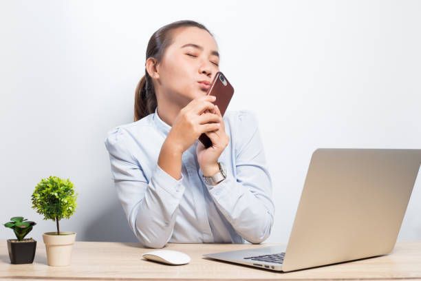istock Woman use smartphone at office 960506356