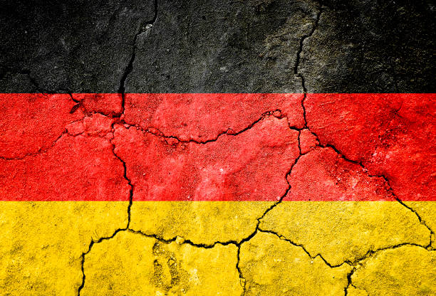 istock Grunge Flag of Germany on cracked surface as background 960509844