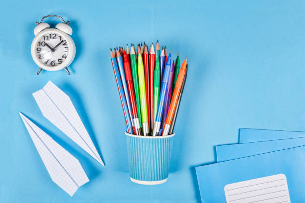istock back to school concept. accessories, college, equipment, study, background, desk, concept: schedule, homework, flat layout. Creative, minimalistic, 960512620