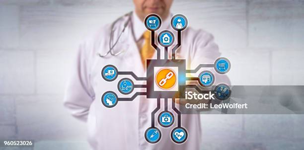 Doctor Activating Blockchain App In Cyberspace Stock Photo - Download Image Now - Healthcare And Medicine, Blockchain, Freight Transportation