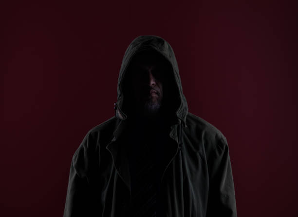 istock shadow portrait of a man in a black mask 960523372