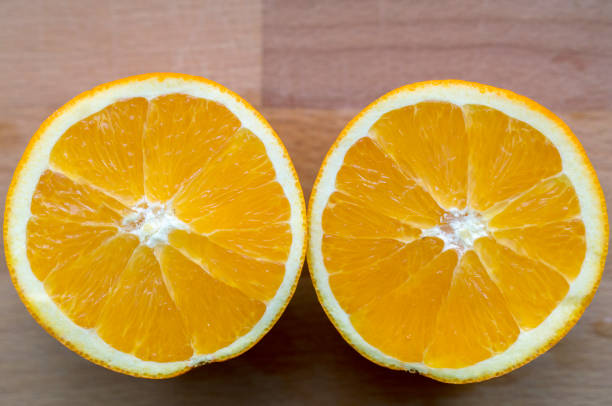 sliced orange isolated on white background. healthy food.