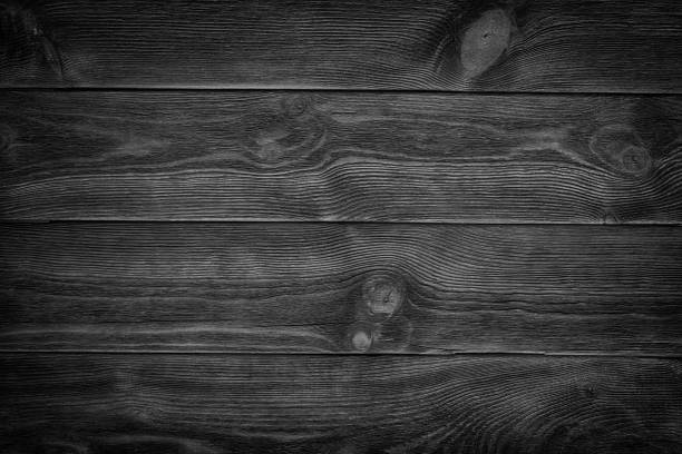 istock Black wooden plank, tabletop, floor surface or chopping, dark wood texture 960527278