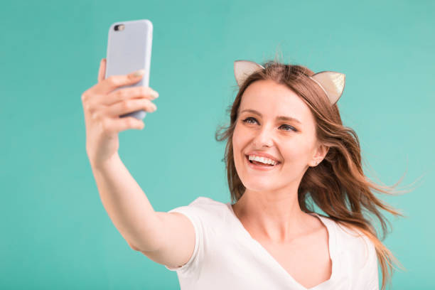 istock Blonde Girl Makes Selfie 960527440