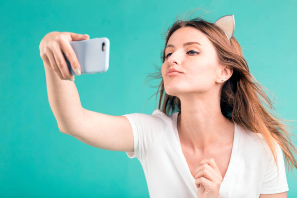 istock Blonde Girl Makes Selfie 960527466
