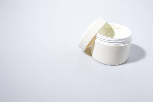 istock Jar full of beauty cream isolated in a white background composition 960527480