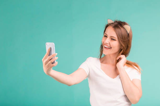 istock Blonde Pretty Girl Makes Selfie 960527550