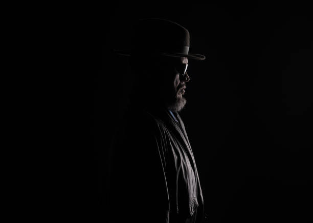 istock Unknown male person silhouette,covered 960532452