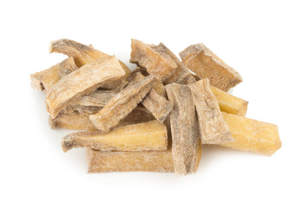 istock pile potato dry isolated on white background. rotten 960532578