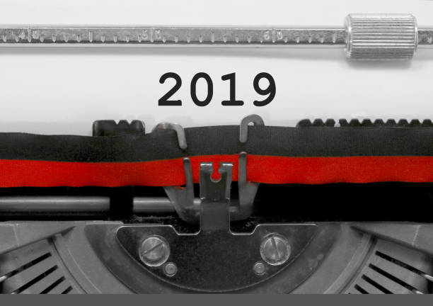 istock 2019 text by the old typewriter on white paper 960539494