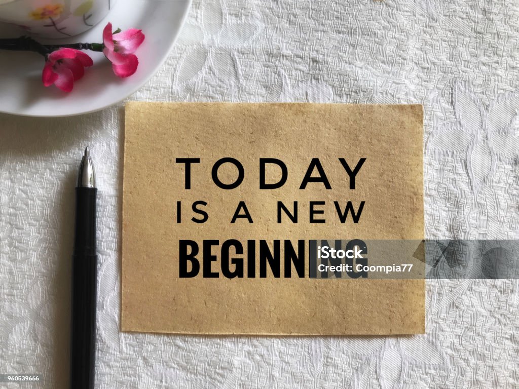 Motivational and inspirational quote. ‘Today is a new beginning’ on an old white piece of paper. With vintage styled background. Motivation Stock Photo